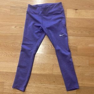 Purple Nike Dry fit leggings.
